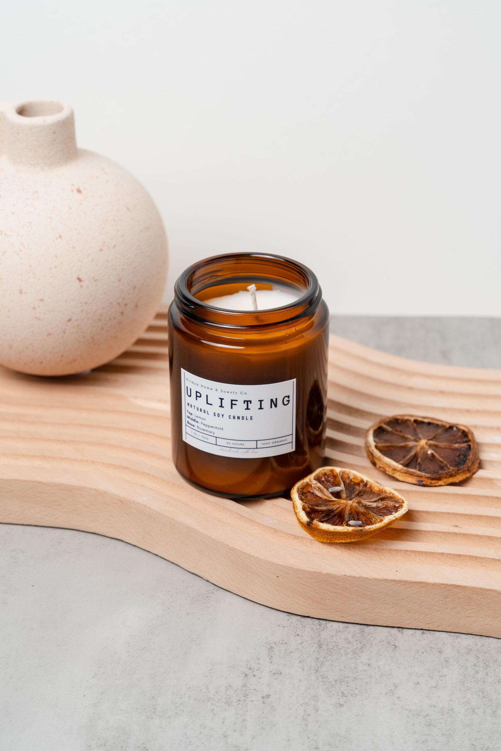 Top view of the Uplifting candle with smooth wax and centered wick.