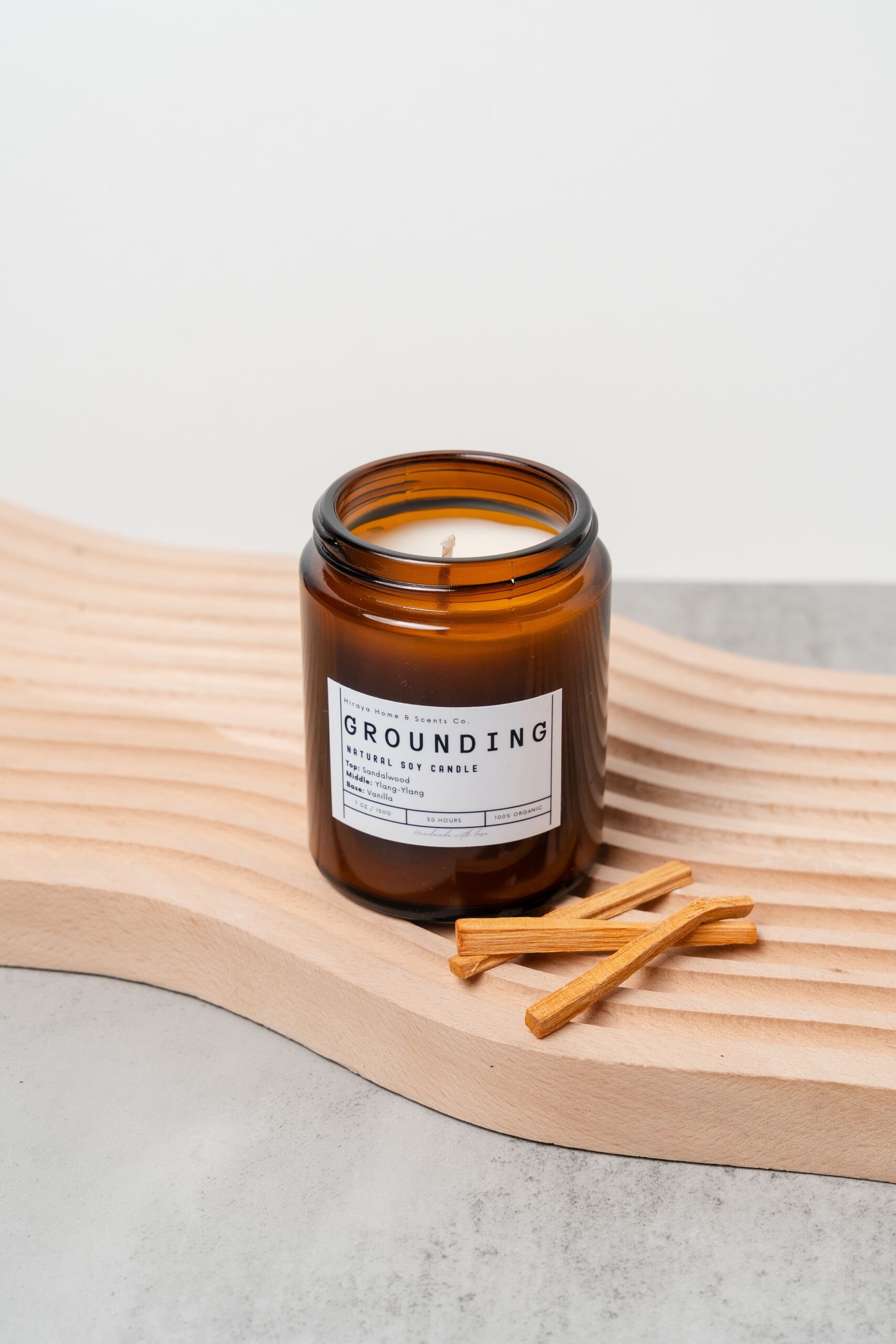 Top view of the Grounding candle with smooth wax and centered wick.