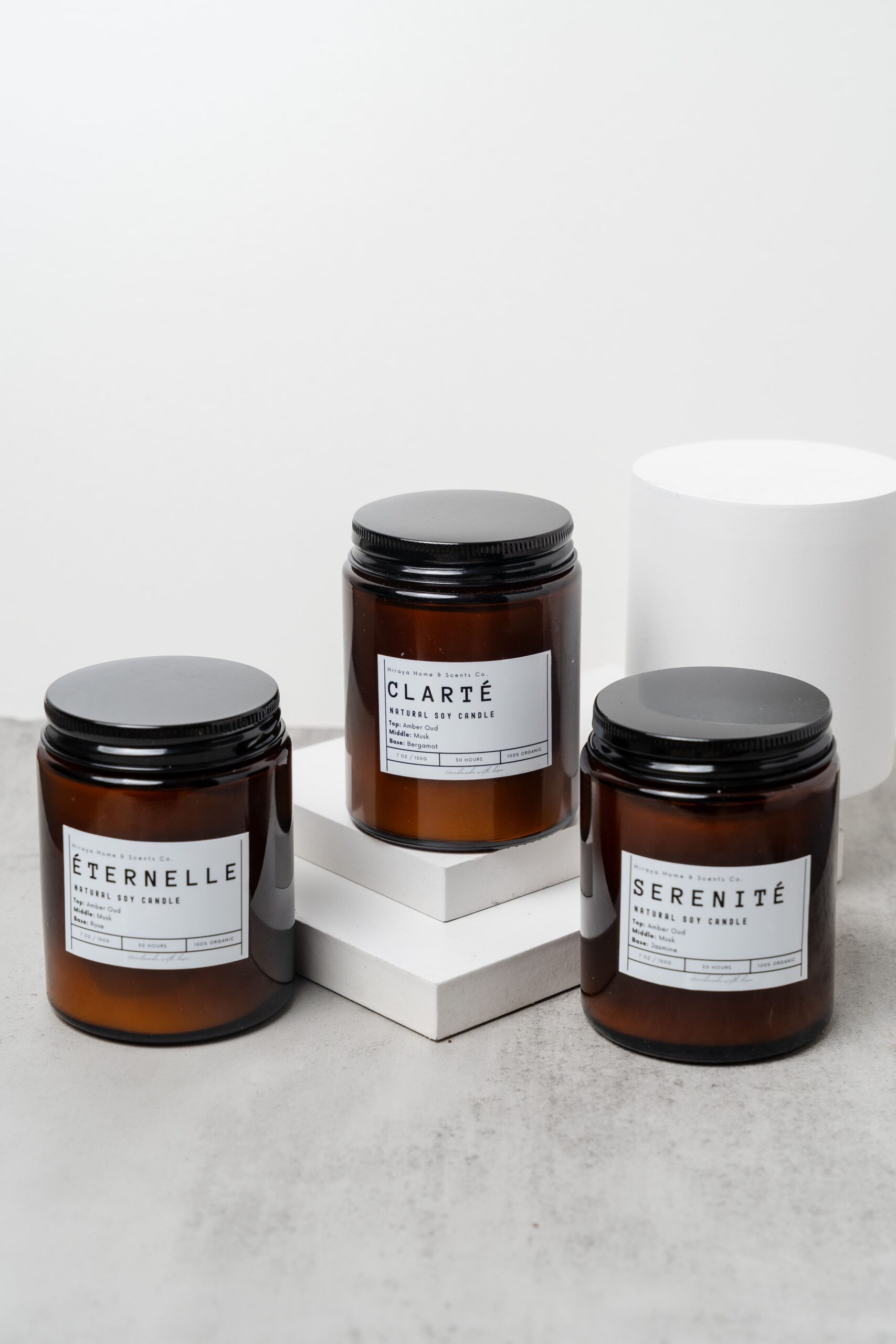 Group display of the Eternelle, Sérénité, and Clarté candles in 150ml jars.