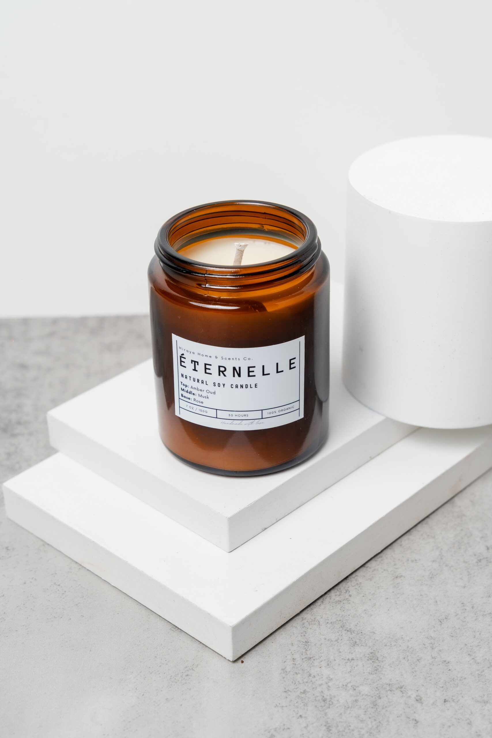 Top view of the Eternelle candle with smooth wax and centered wick.