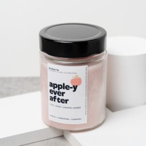 Front view of the Apple‑y Ever After candle with its warm apple‑cinnamon label in a 280ml jar.