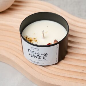 Front view of the Petal Me About It candle with its romantic amber‑oud‑rose label in a 220ml jar, styled in a minimal, elegant aesthetic.