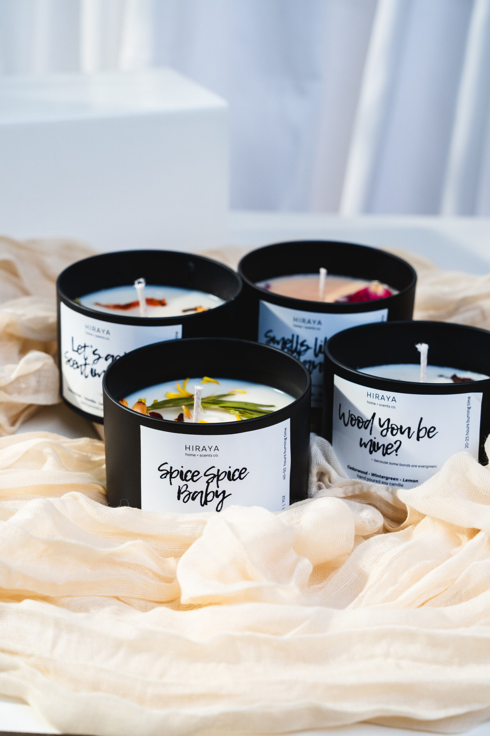 Floral Collection candle set styled in a soft, romantic flatlay with spring-inspired floral elements