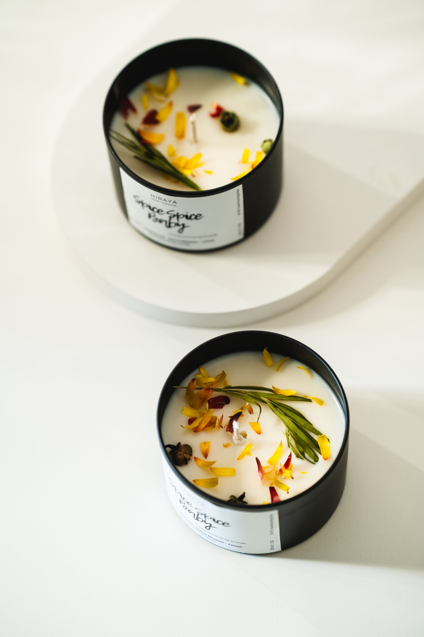 Close up of soy candle showing the dried flowers design