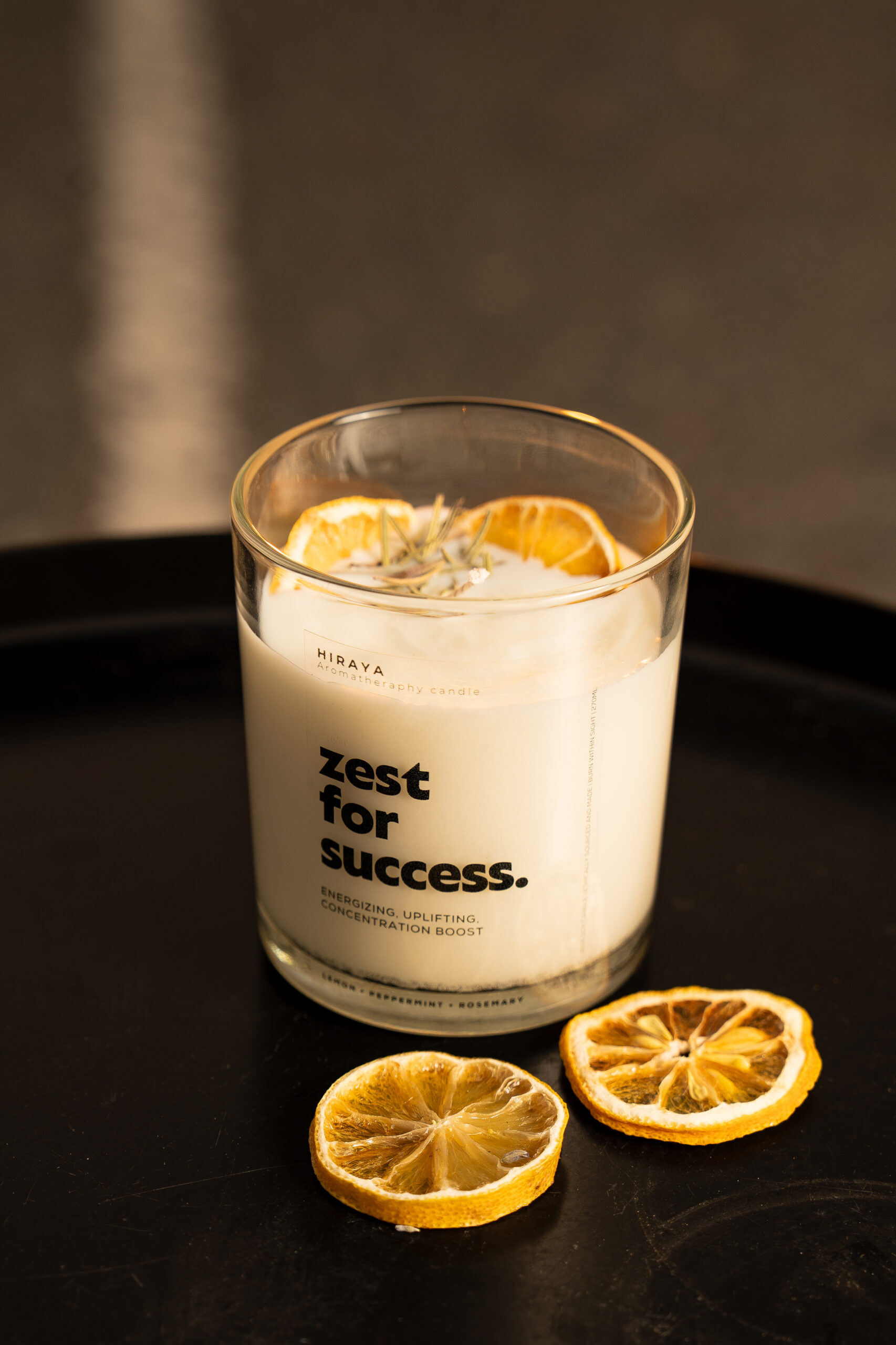 Desert‑style lifestyle photo of energizing lemon and peppermint candle for a bright, refreshing mood